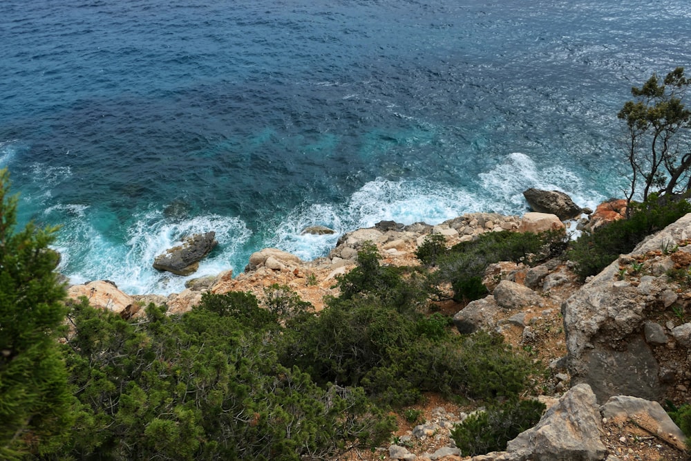 a view of a body of water from a cliff