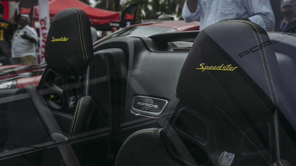 the interior of a sports car with the seats up