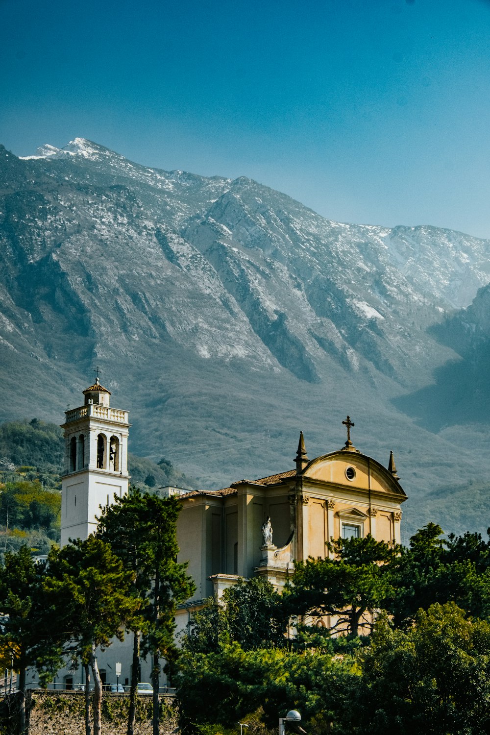 a church in the middle of a mountain range