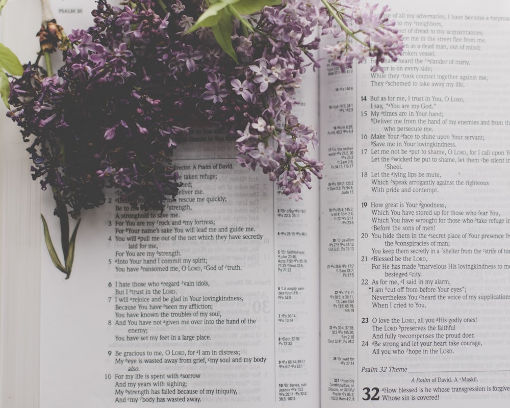 a book with a bunch of flowers on top of it