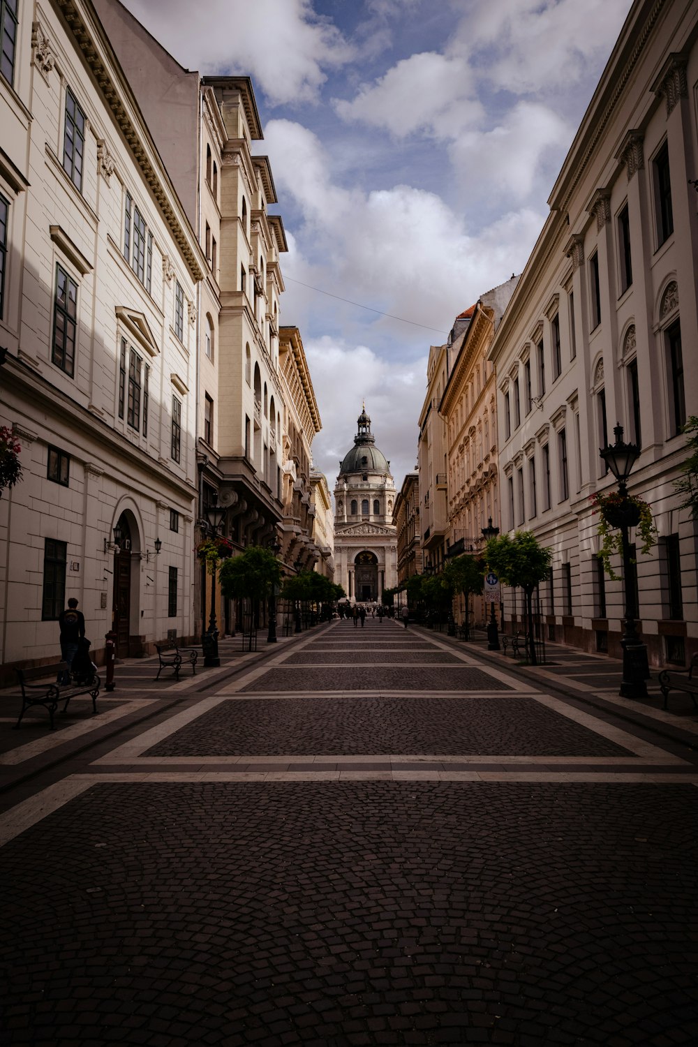 a cobblestone street in a european city