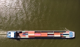 a large cargo ship with a lot of containers on it