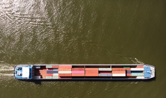 a large cargo ship with a lot of containers on it