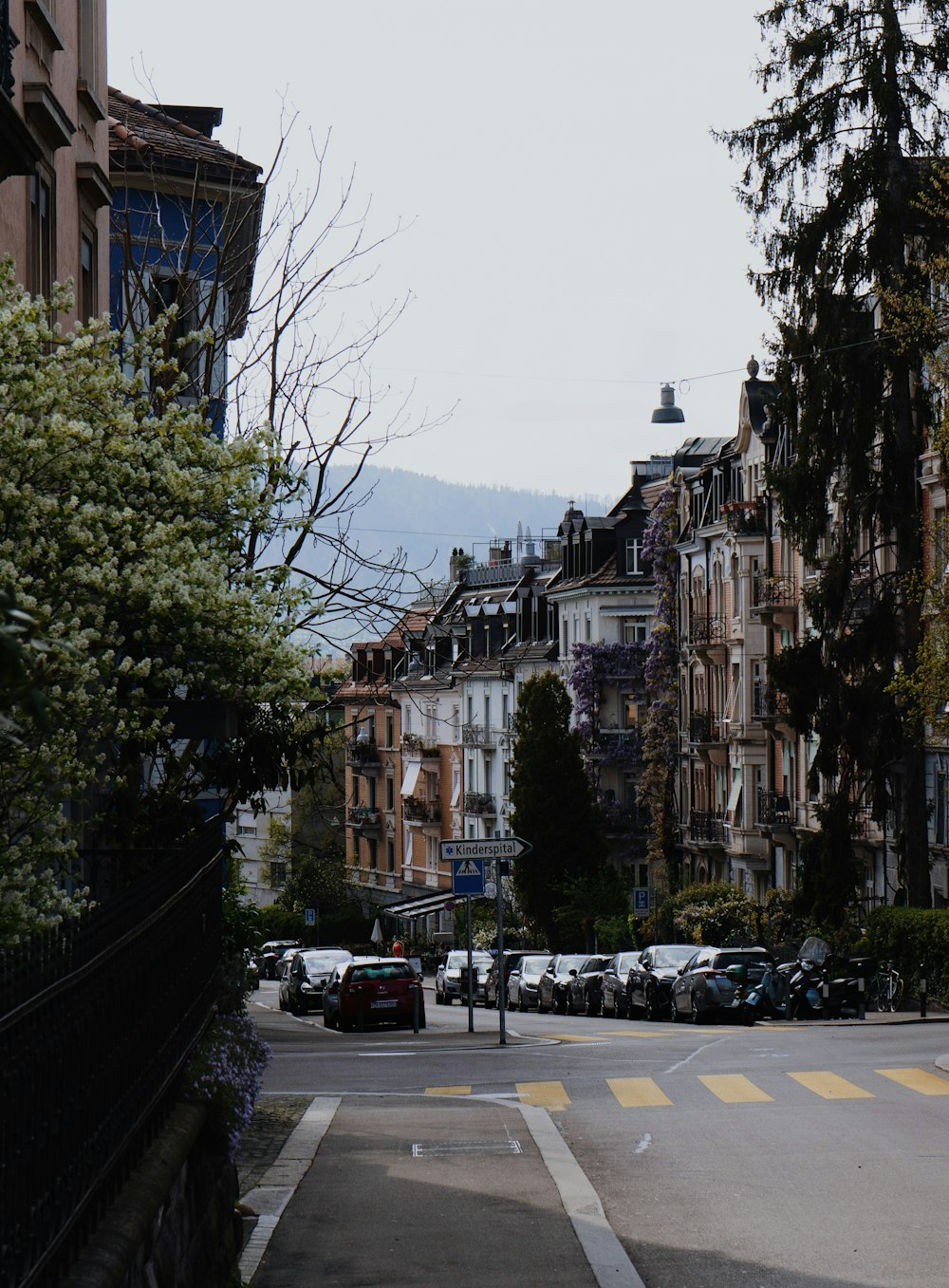 a city street filled with lots of tall buildings