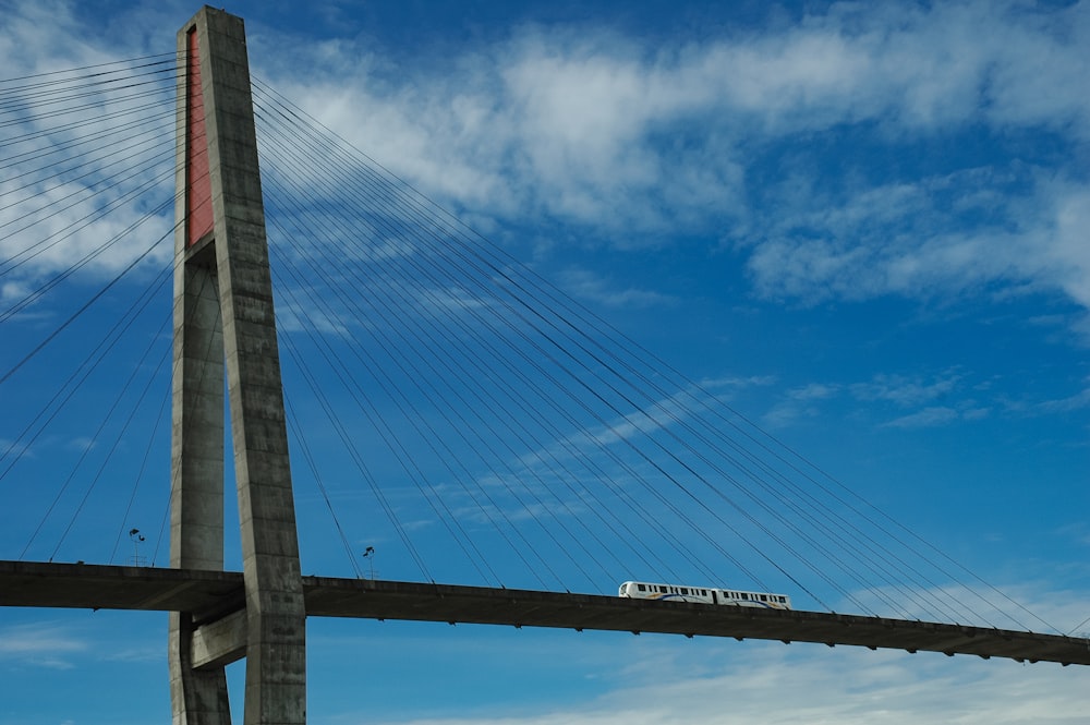a very tall bridge with a sign on it