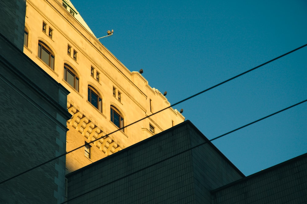 a tall building with a clock on the top of it