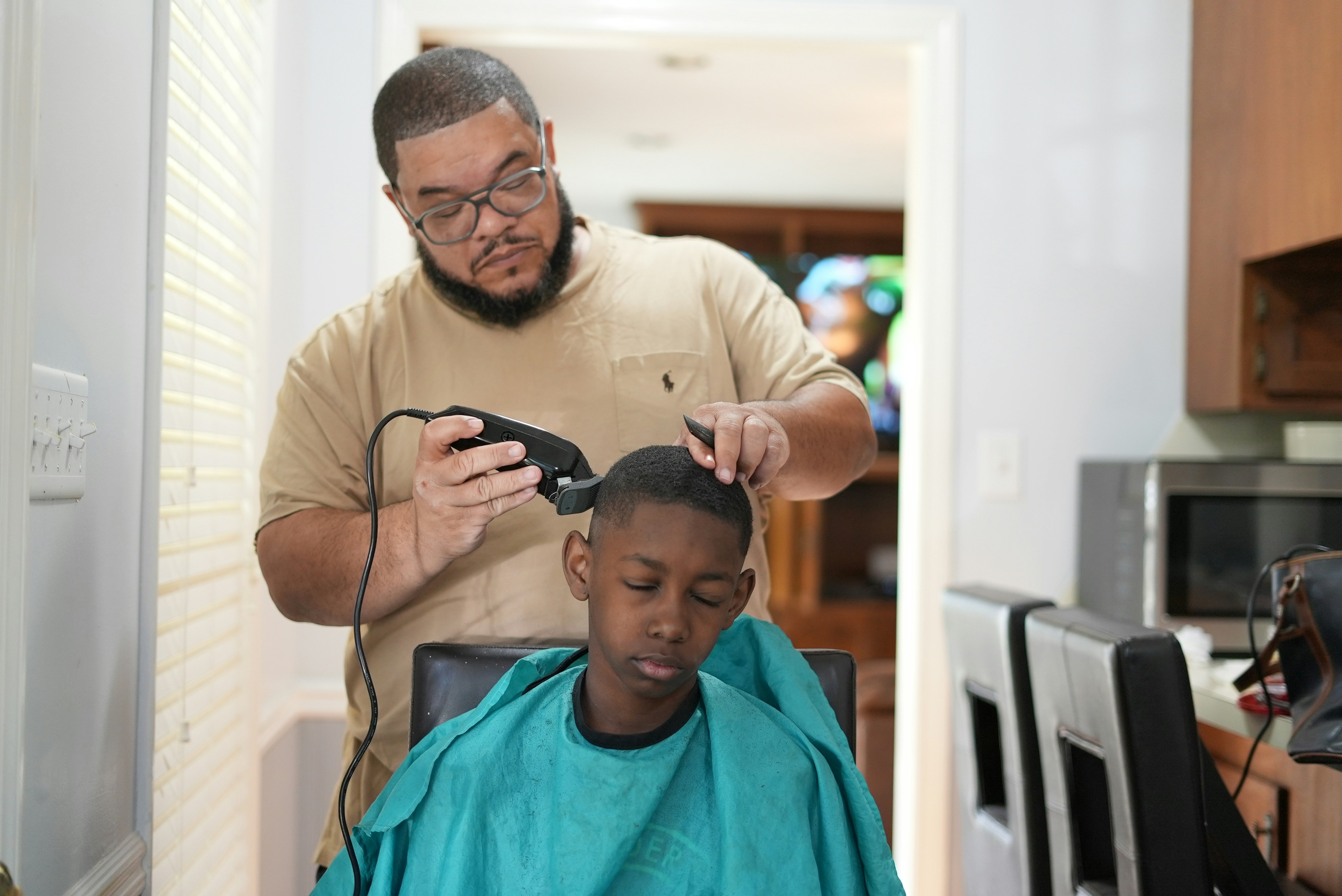 Child enjoying a professional kids haircut