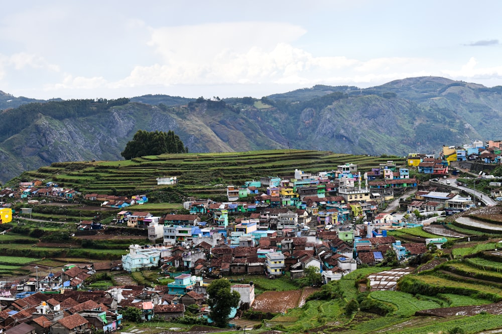 a village in the middle of a mountain range