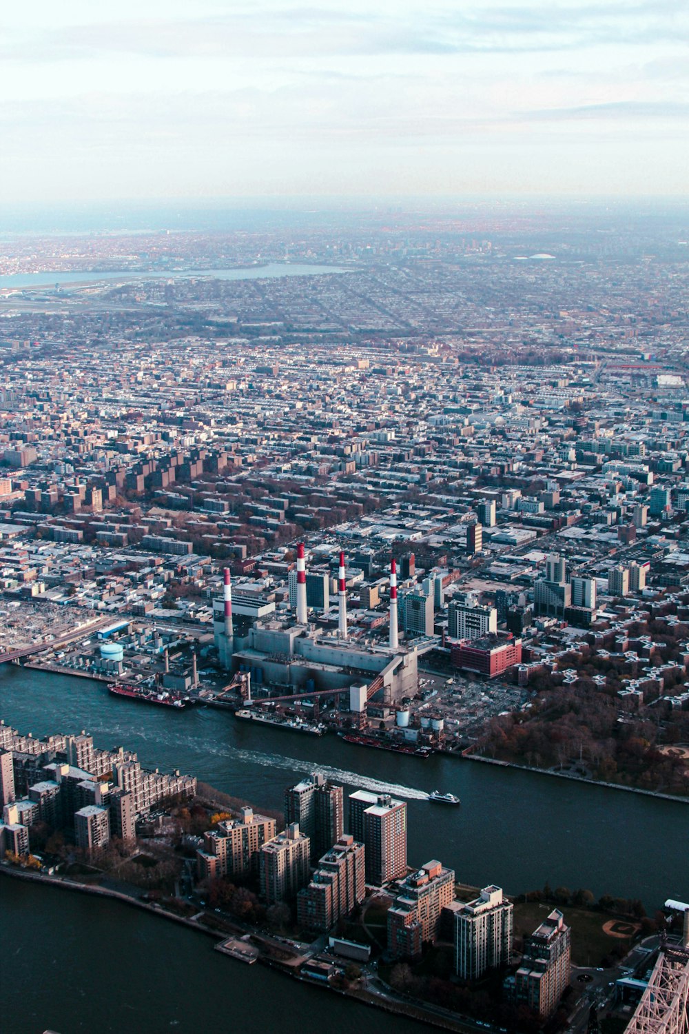 an aerial view of a city and a river