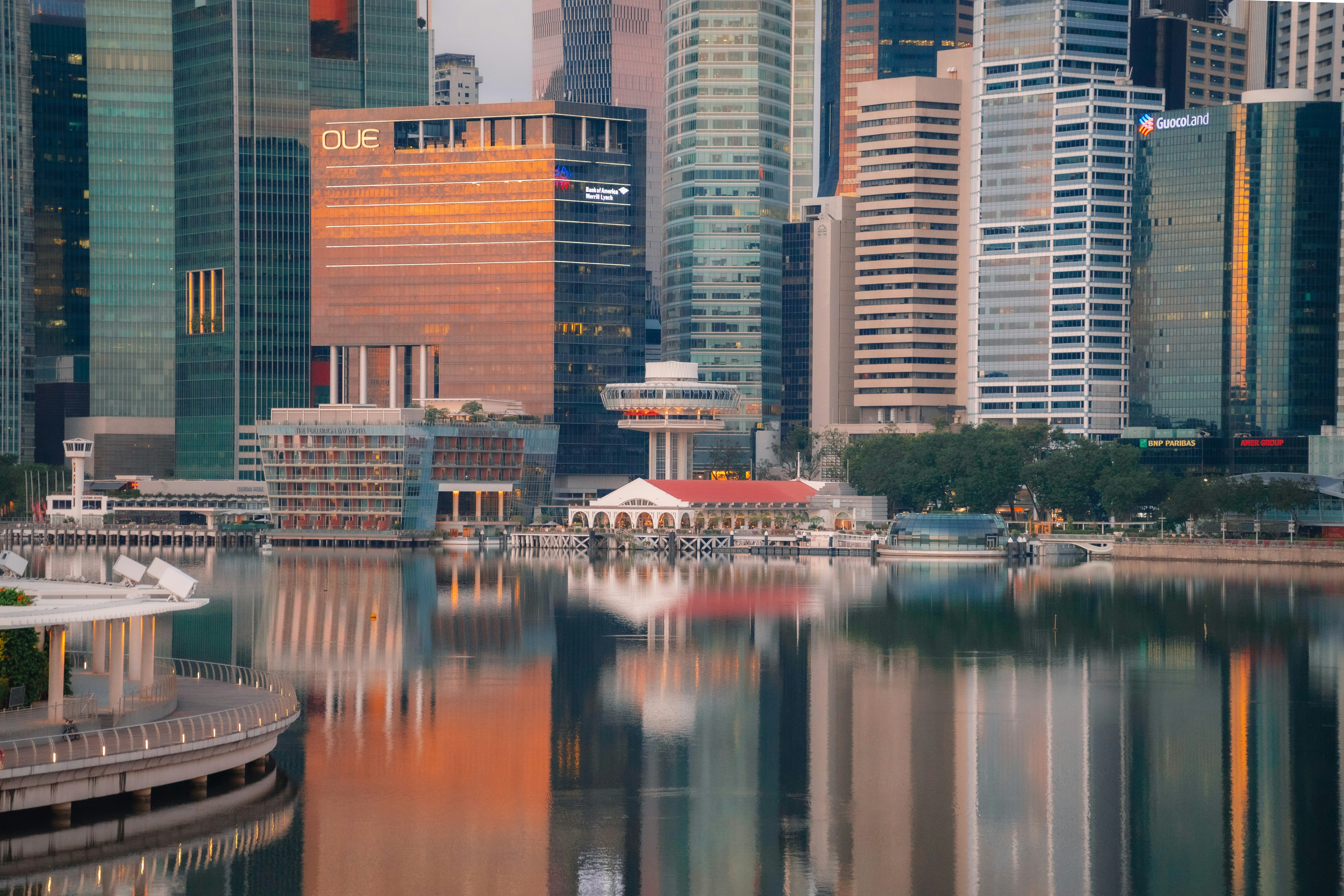 a body of water surrounded by tall buildings