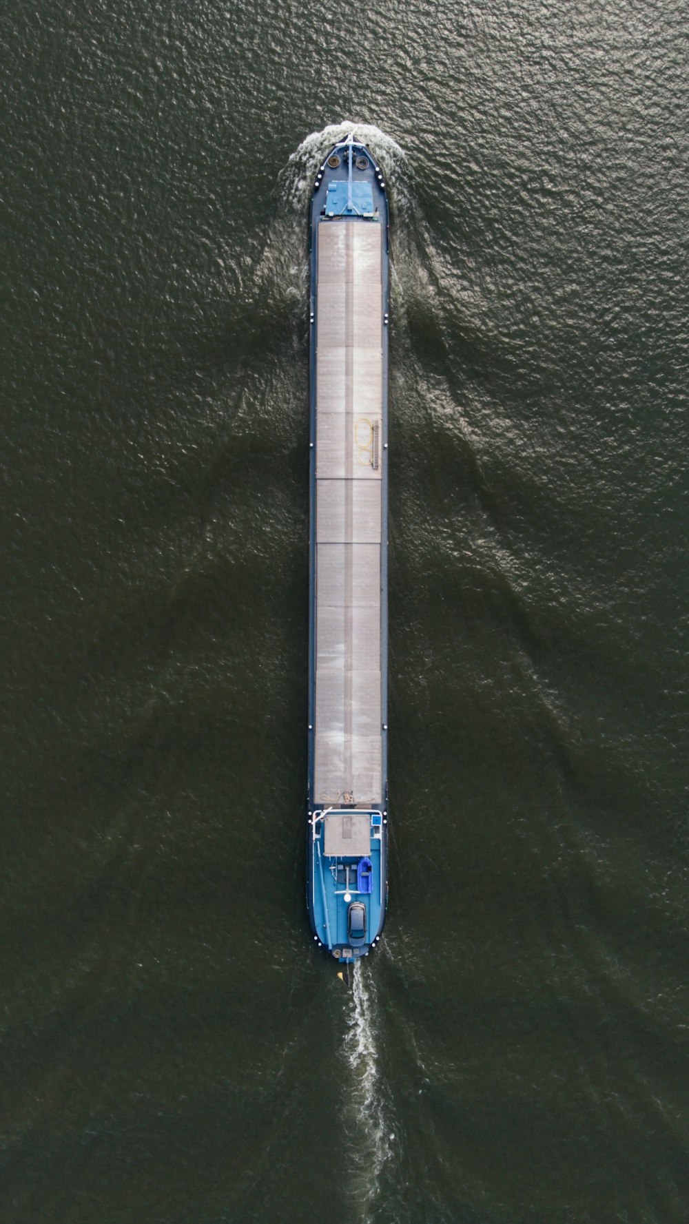 a large boat floating on top of a large body of water