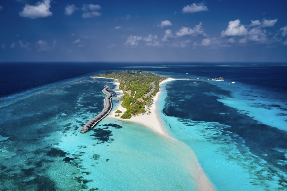 an aerial view of an island in the middle of the ocean