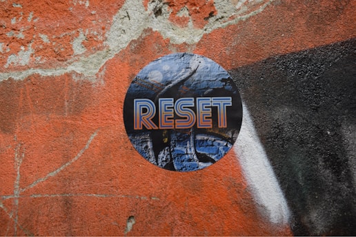 a round sticker on the side of a wall