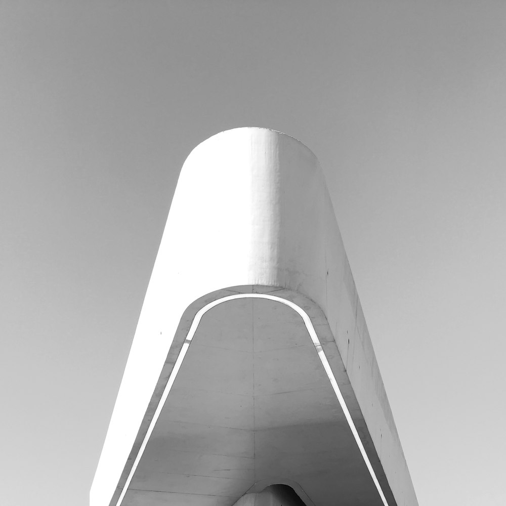 a black and white photo of a tall building