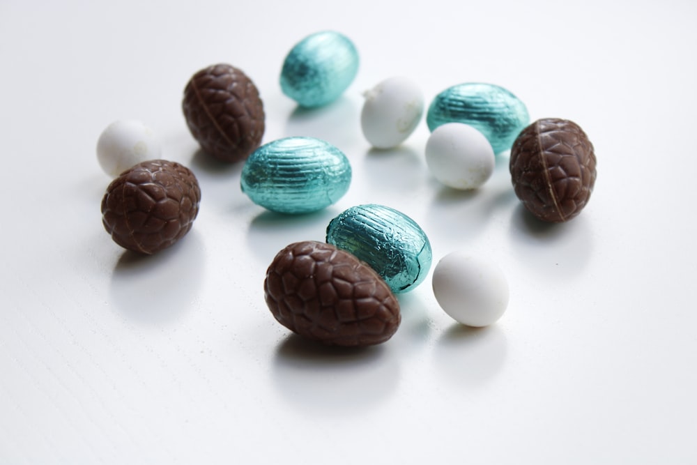 a group of chocolates and white and blue candies