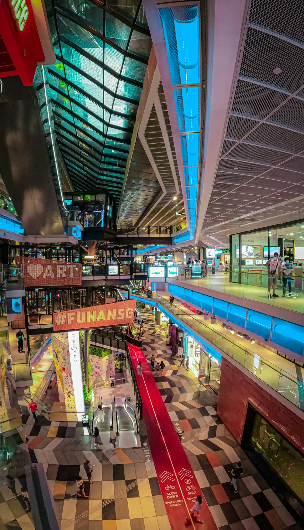 an overhead view of a shopping mall filled with people