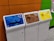 Three recycling bins are lined up next to each other against a colorful wall. The bins are labeled for different materials: paper with a blue top, plastic with a brown top, and aluminum with a yellow top. Each bin has a distinct shape for the deposit slot appropriate for the material.