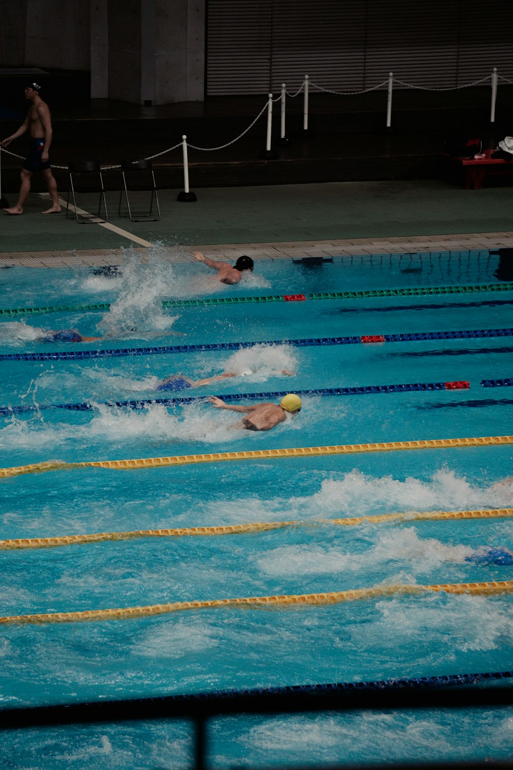 a man flying through the air over a body of water