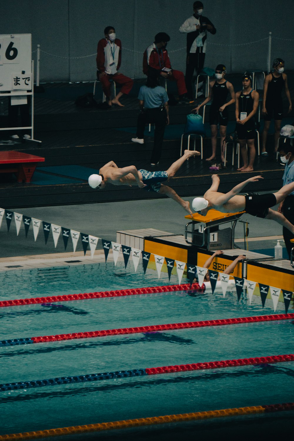 a group of people jumping in the air