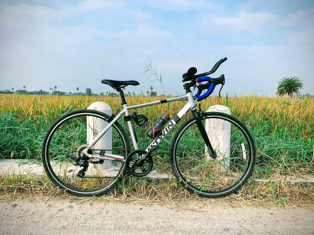 a bike parked on the side of a road