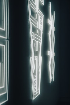 High-contrast neon green abstract digital art installation with sharp geometric shapes.