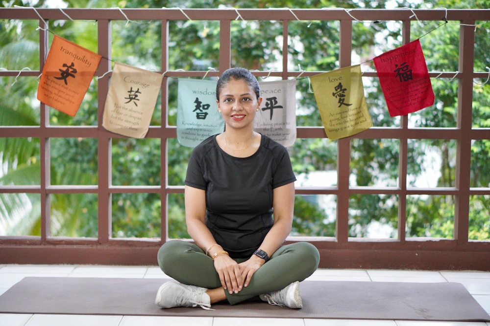Practitioner in a guided yoga pose at the studio