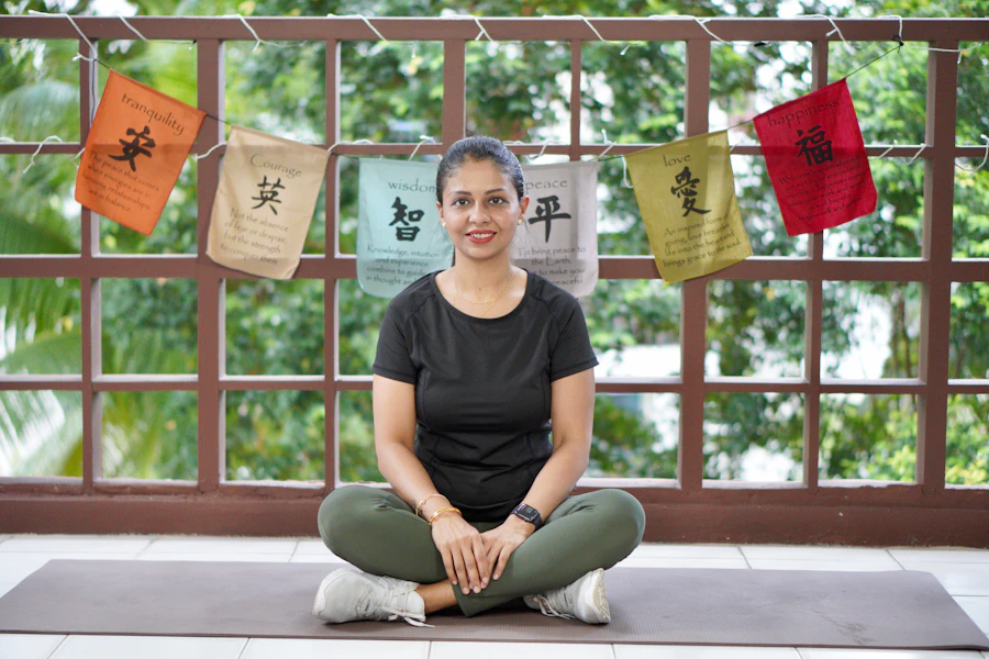 Indian woman practicing a yoga pose at the studio