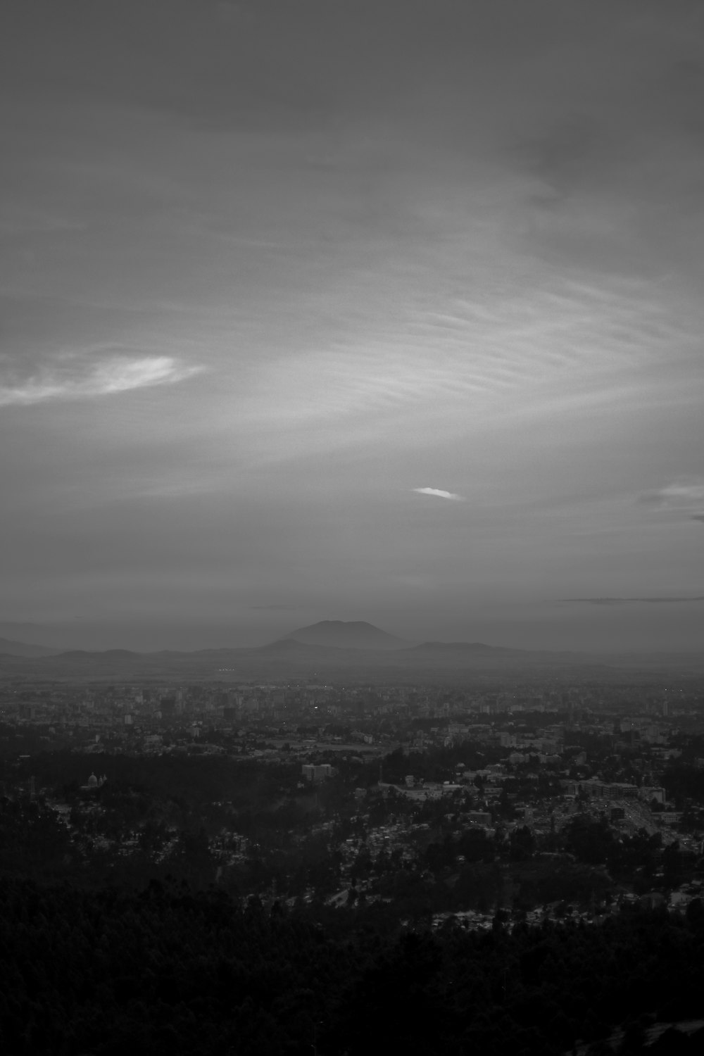 a black and white photo of a cloudy sky