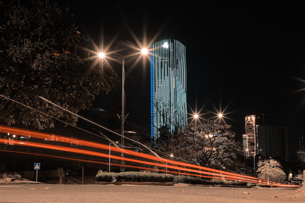 a city street at night with street lights