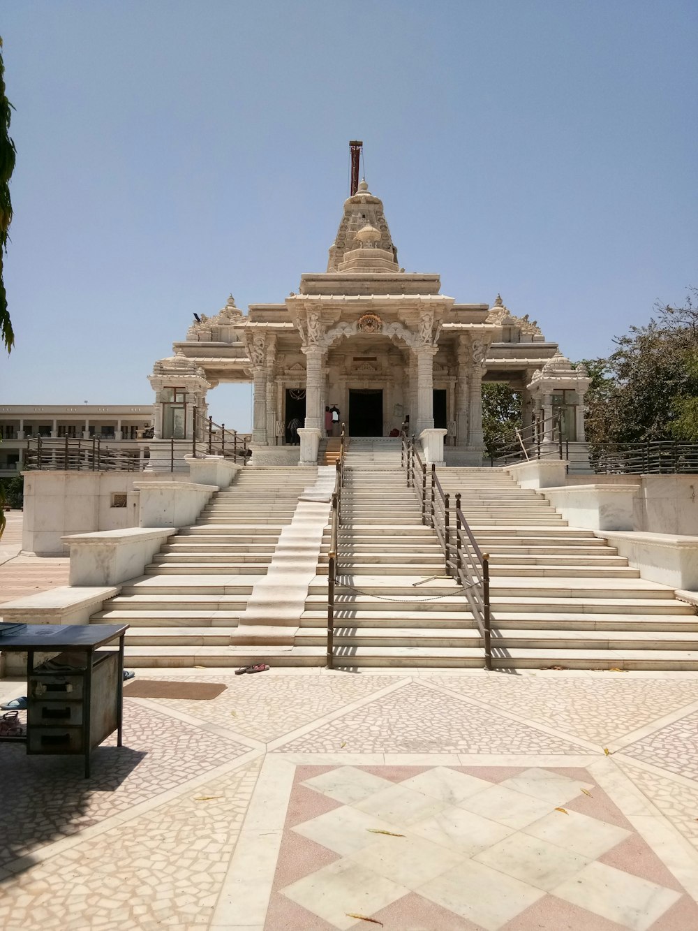 a large white building with steps leading up to it