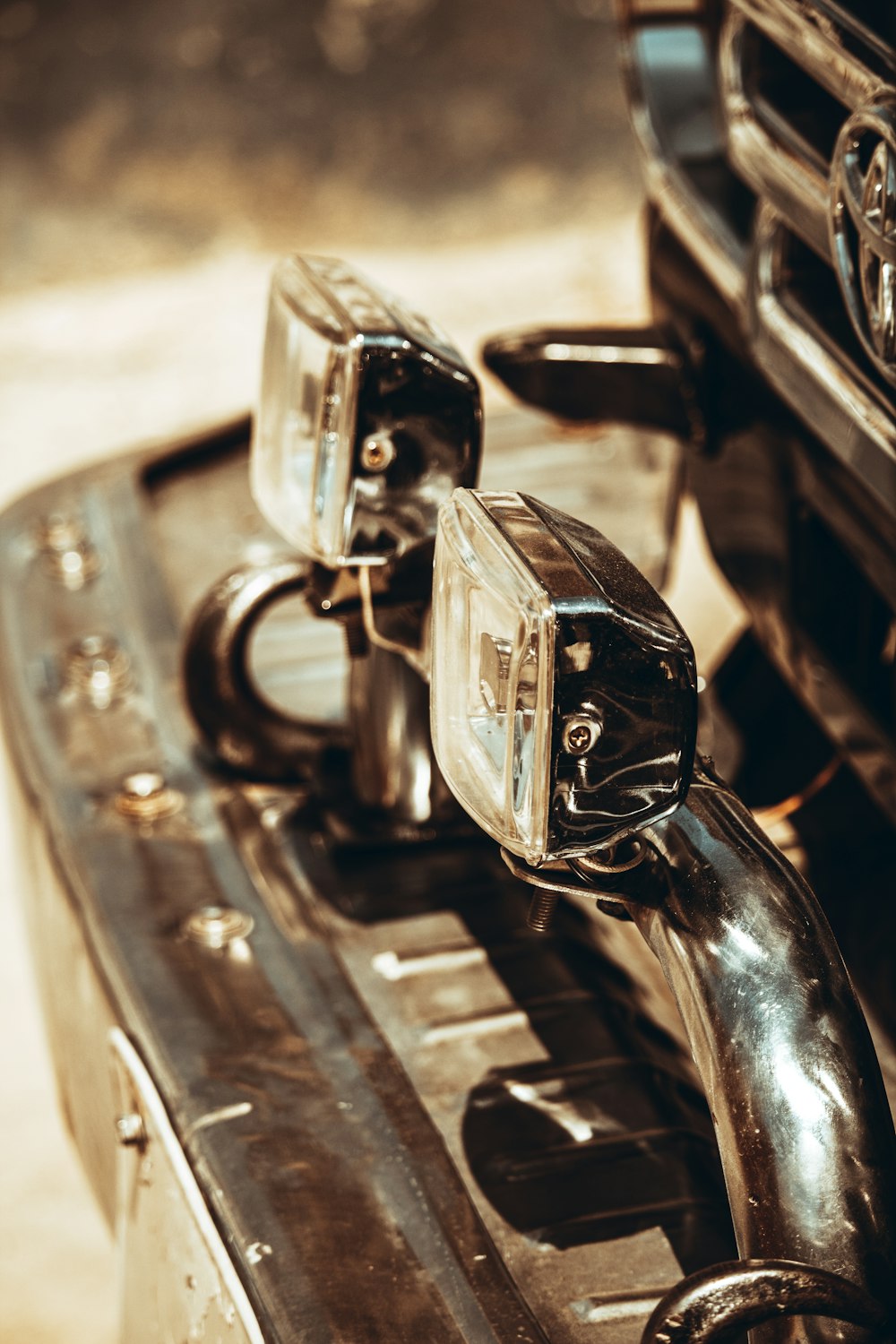 a close up of a car's front bumper light