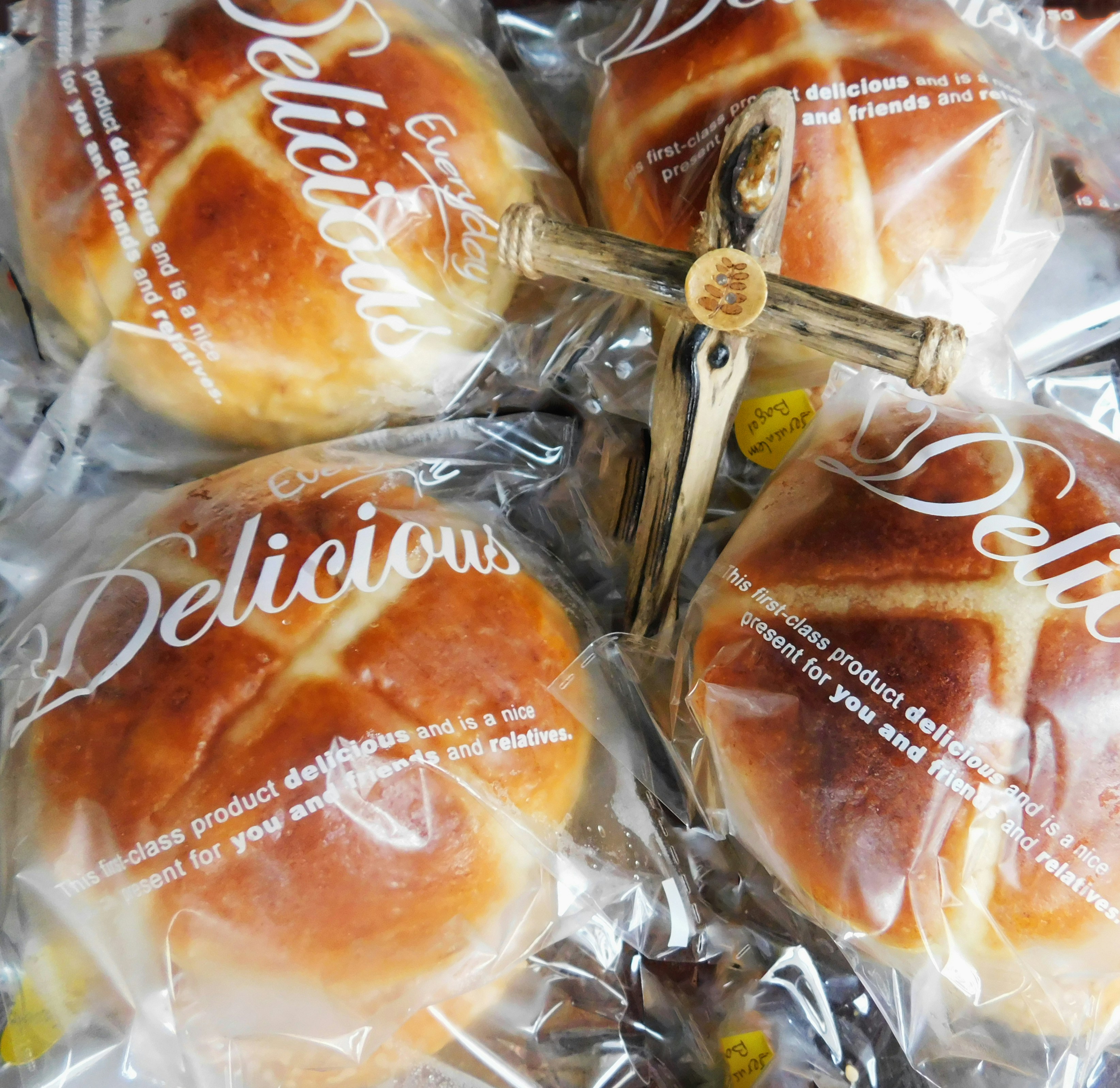 a close up of a bunch of bread wrapped in plastic