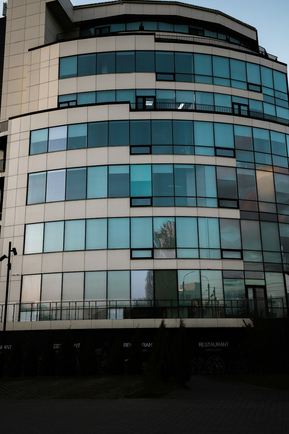 a large building with many windows and a clock