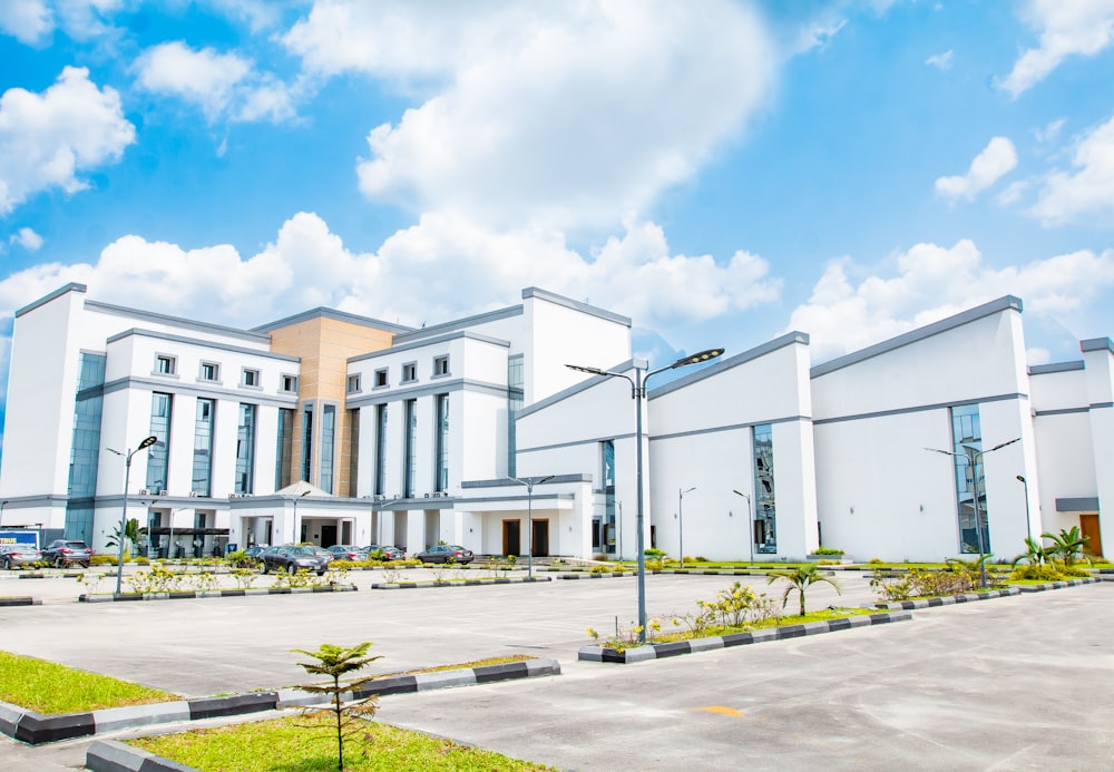 a large white building with a sky background