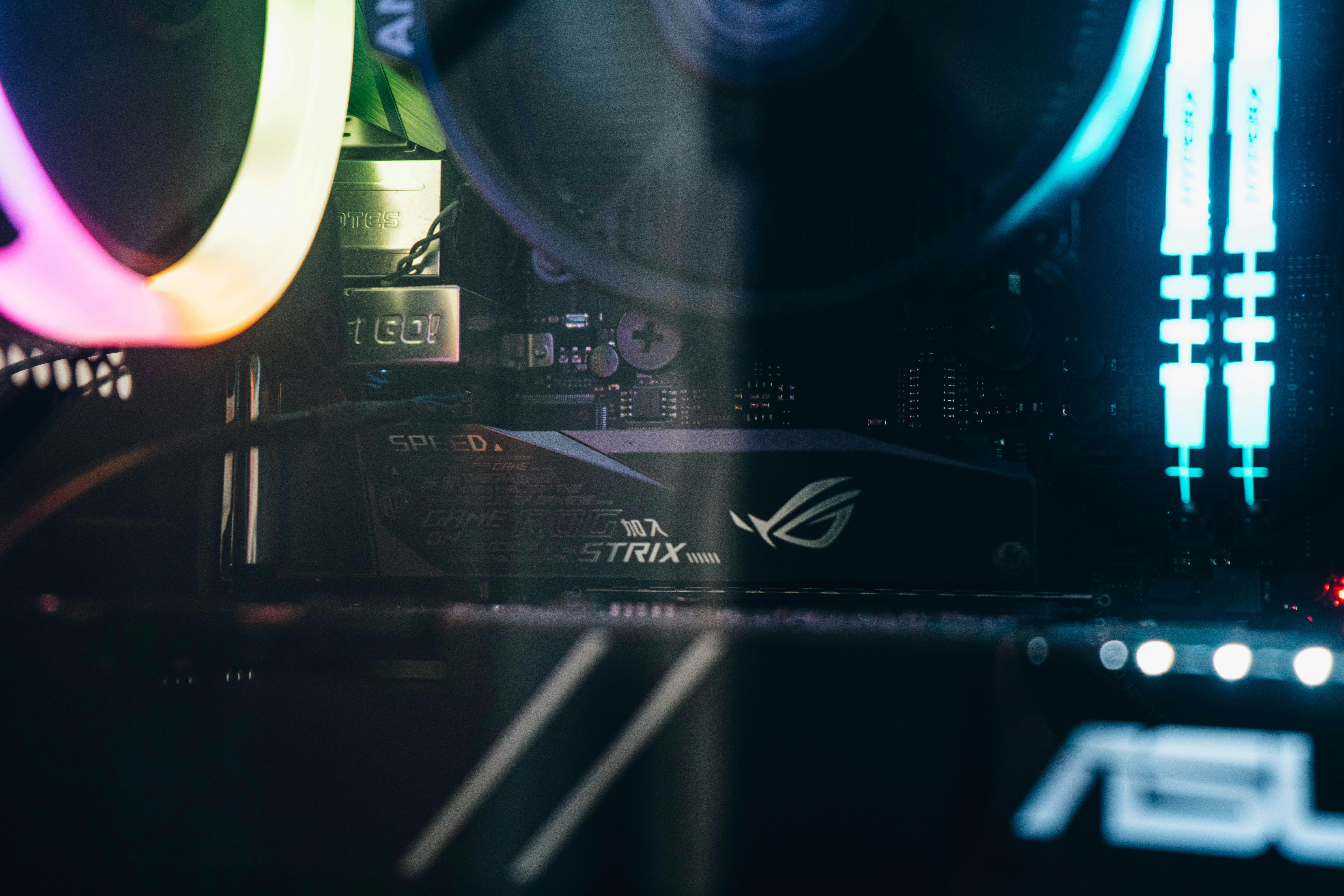 a close up of a computer with neon lights