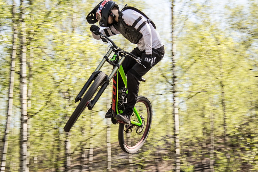 a person jumping a bike in the air