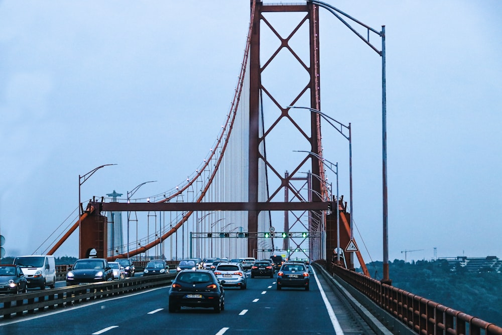 a view of a bridge with cars driving on it