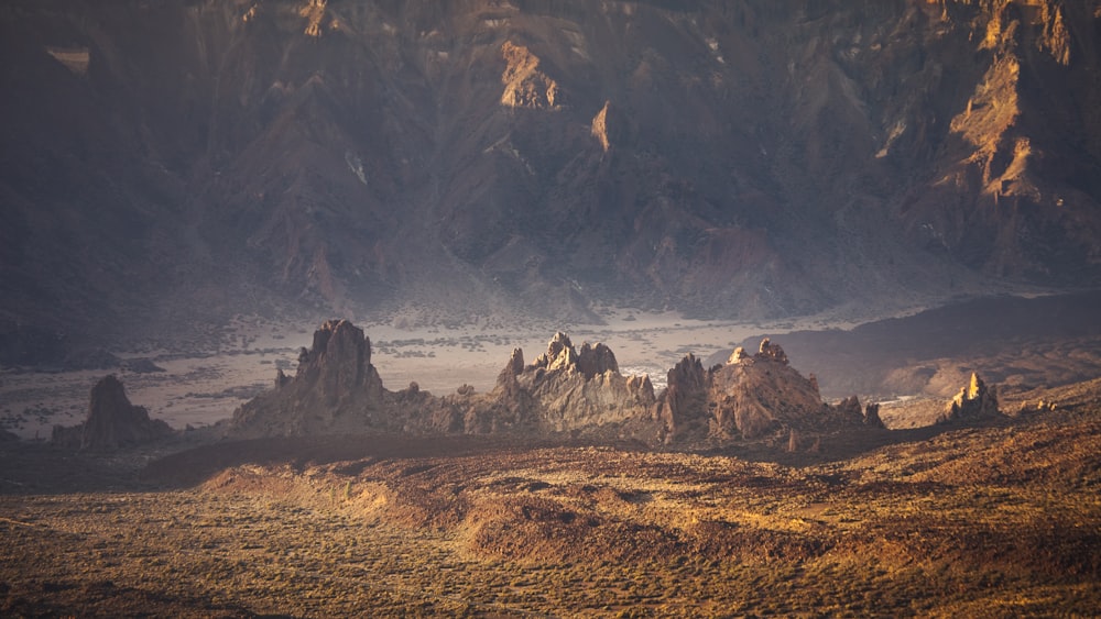 a group of rocks in the middle of a desert