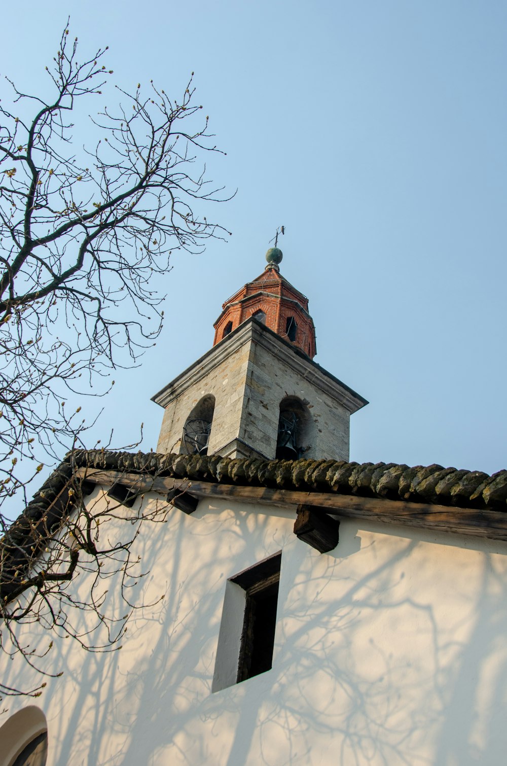 a tall building with a clock on the top of it