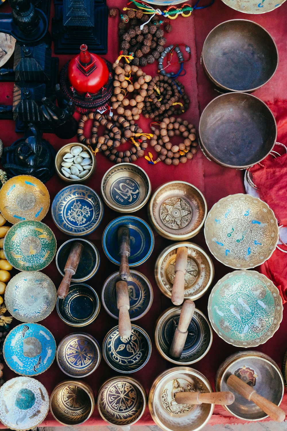 a table topped with lots of bowls filled with food