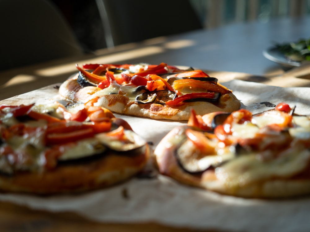 a close up of a pizza on a table