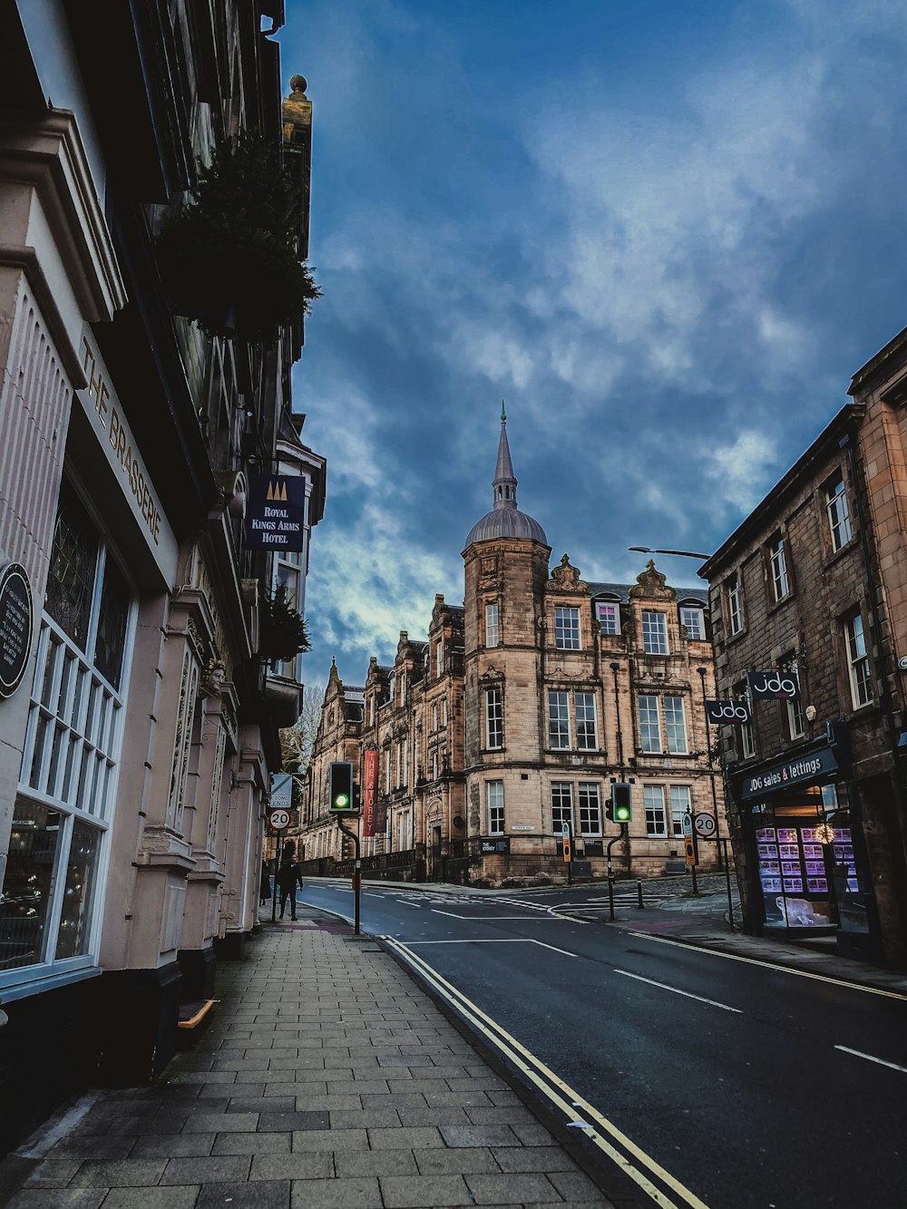 a city street with buildings on both sides of it