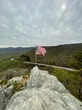 An American flag waving proudly over Idaho’s rugged wilderness.