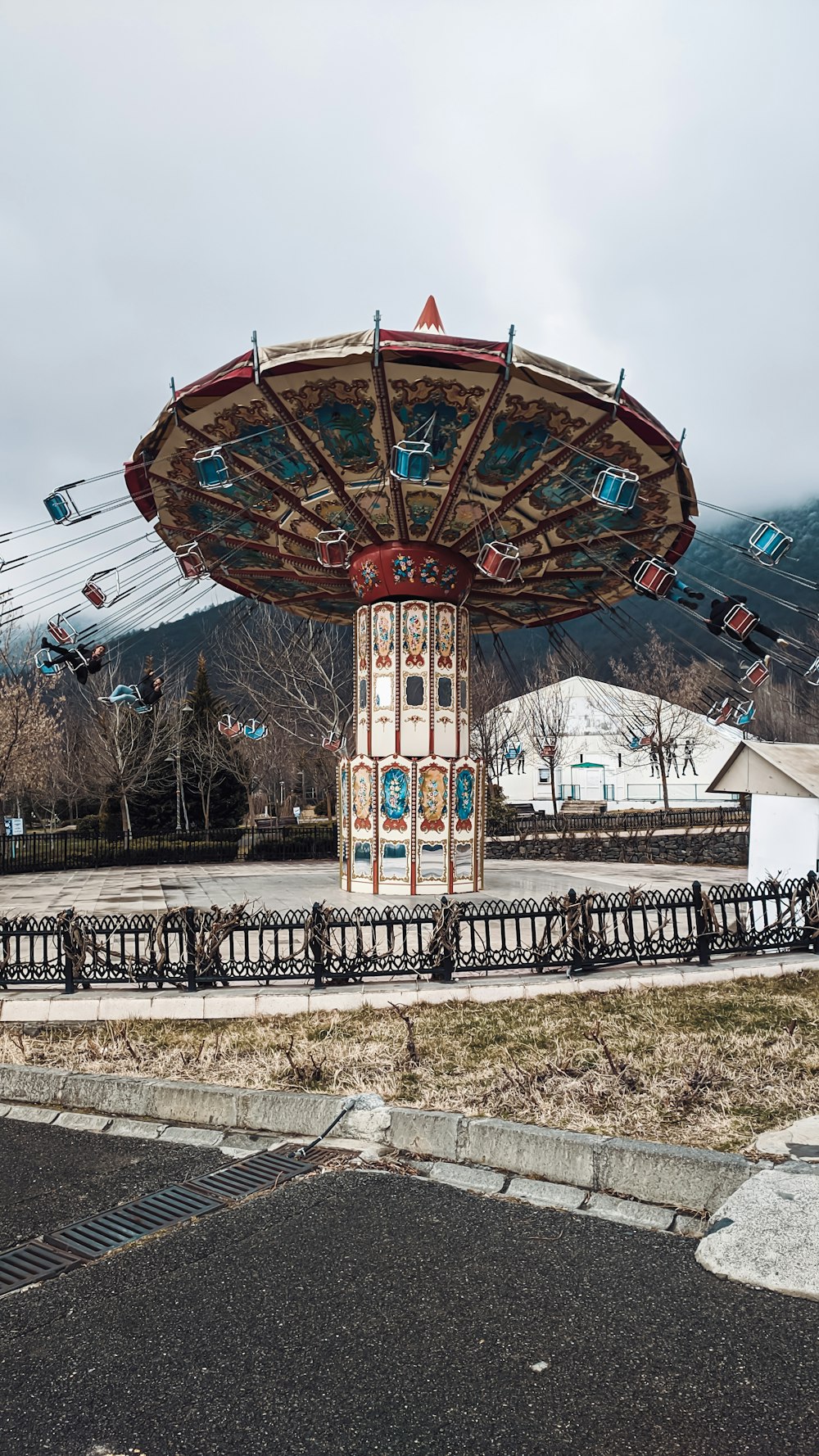 a merry go round in the middle of a park