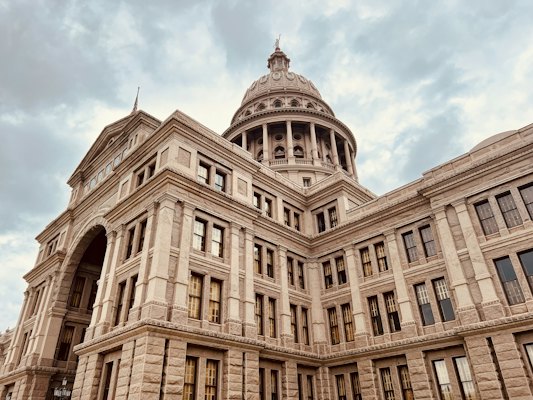 A large building with a clock on the top of it — Austin, United States