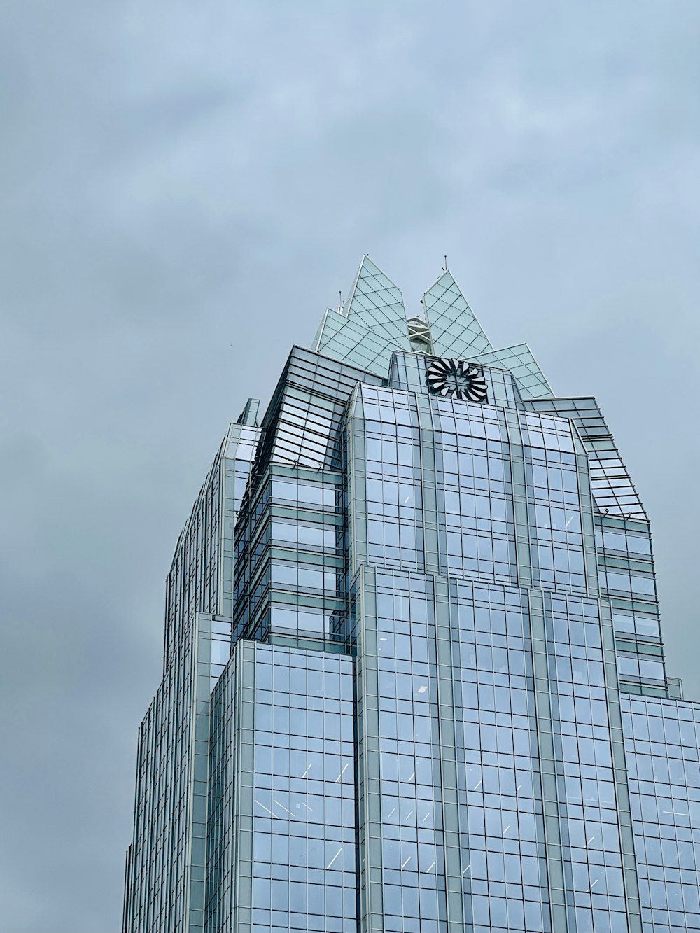 a very tall building with a clock on the top