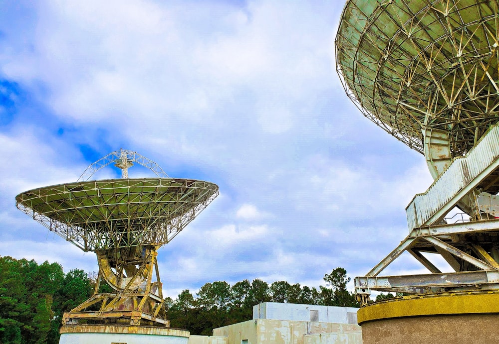 two large satellite dishes sitting next to each other