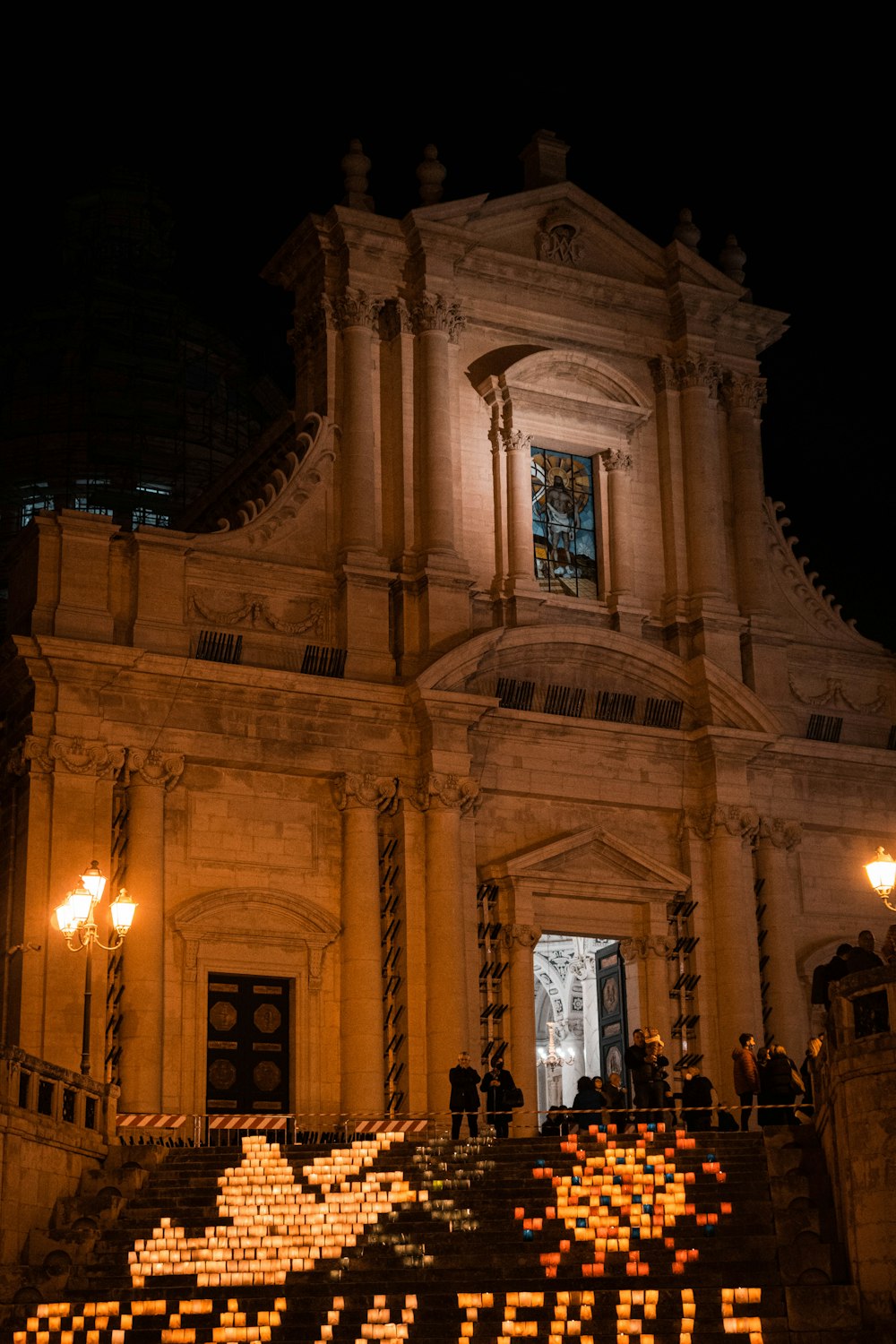 a large building with a clock on the front of it