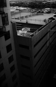 a black and white photo of a parking lot