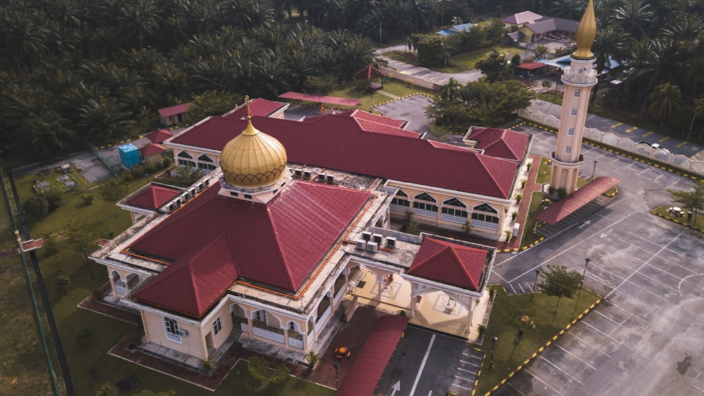 an aerial view of a building with a golden dome